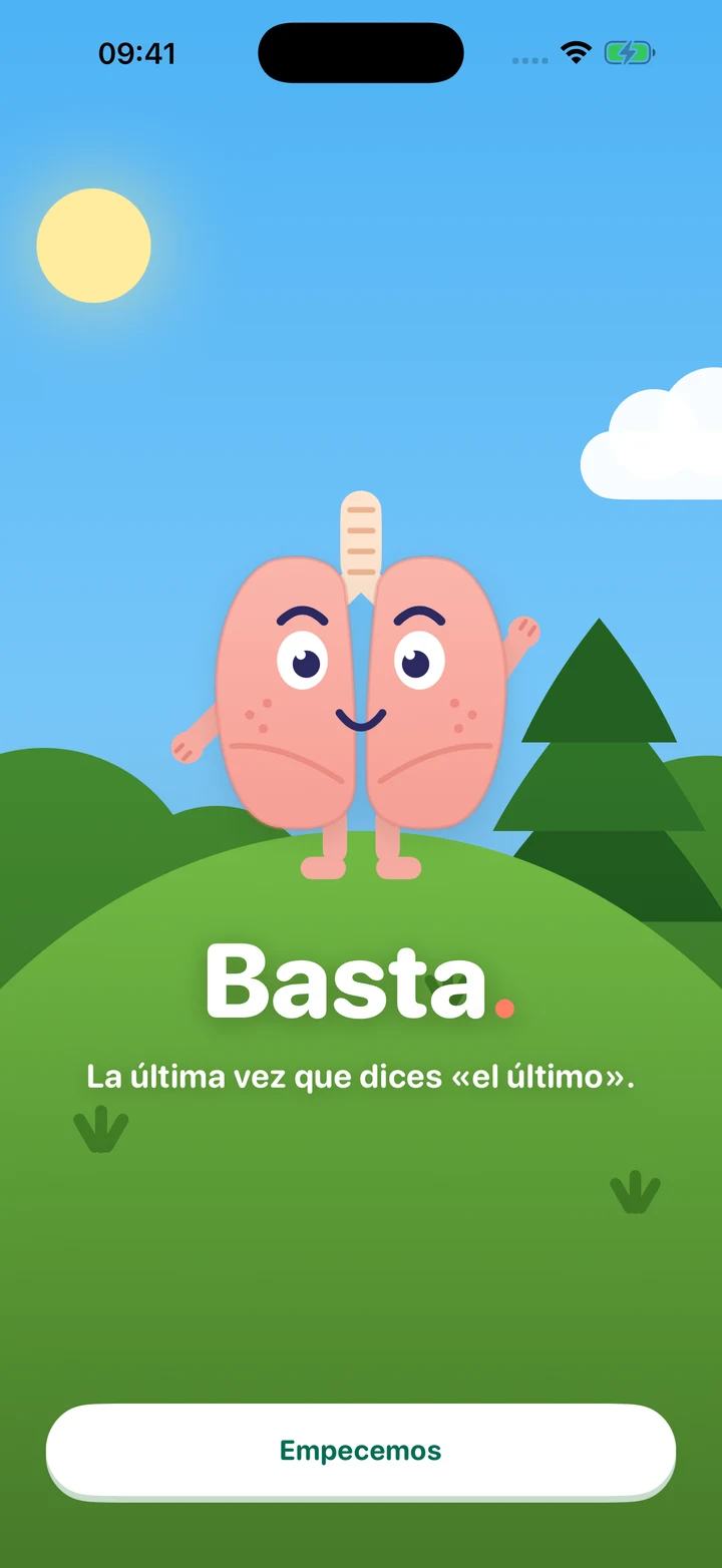 La mascota de Basta, dos pulmones rosas sonrientes en un prado soleado. El mensaje de bienvenida dice: La última vez que dices «el último».