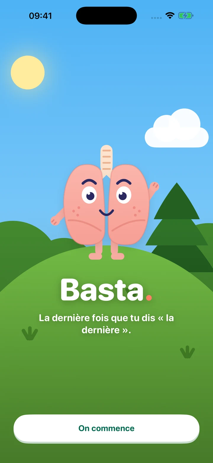 La mascotte de Basta, deux poumons roses souriants dans une prairie ensoleillée. Le message d’accueil dit : La dernière fois que tu dis « la dernière ».